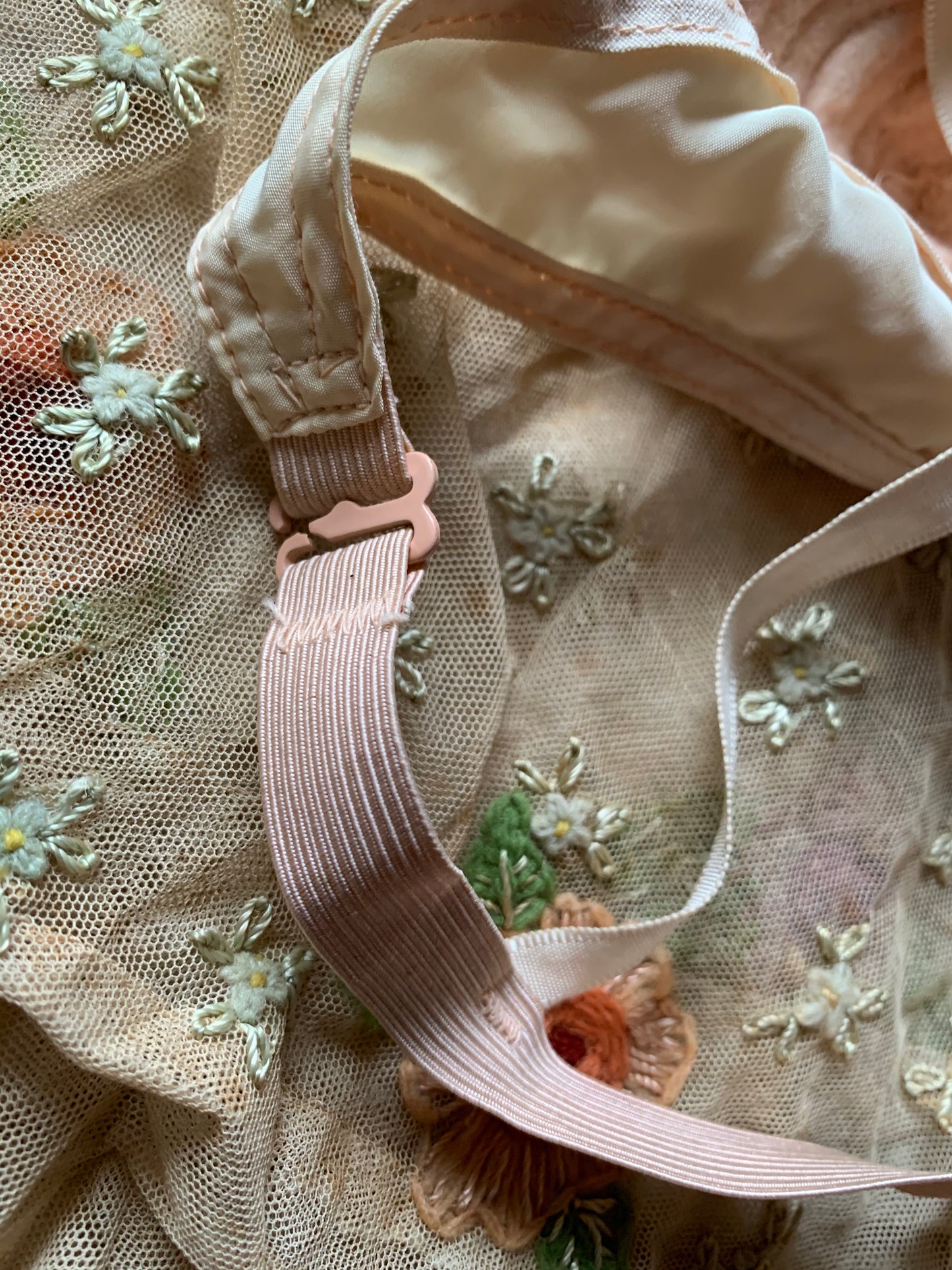 Vintage old pink ruffly bra