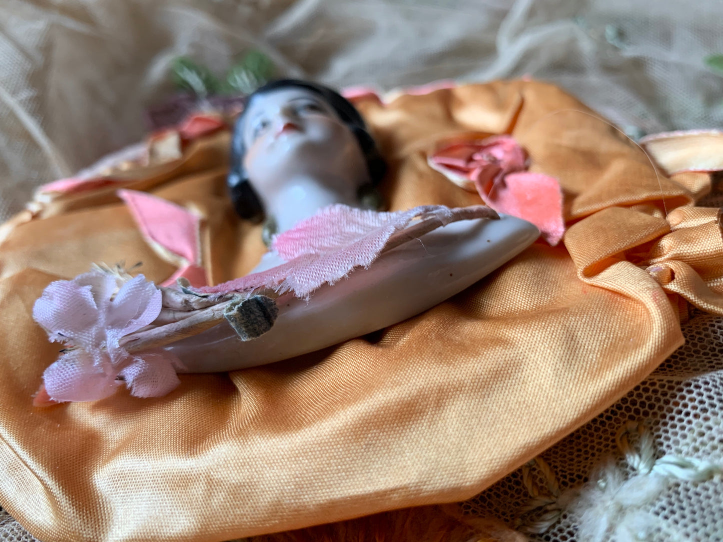 Vintage porcelain half doll flat back bust on silk