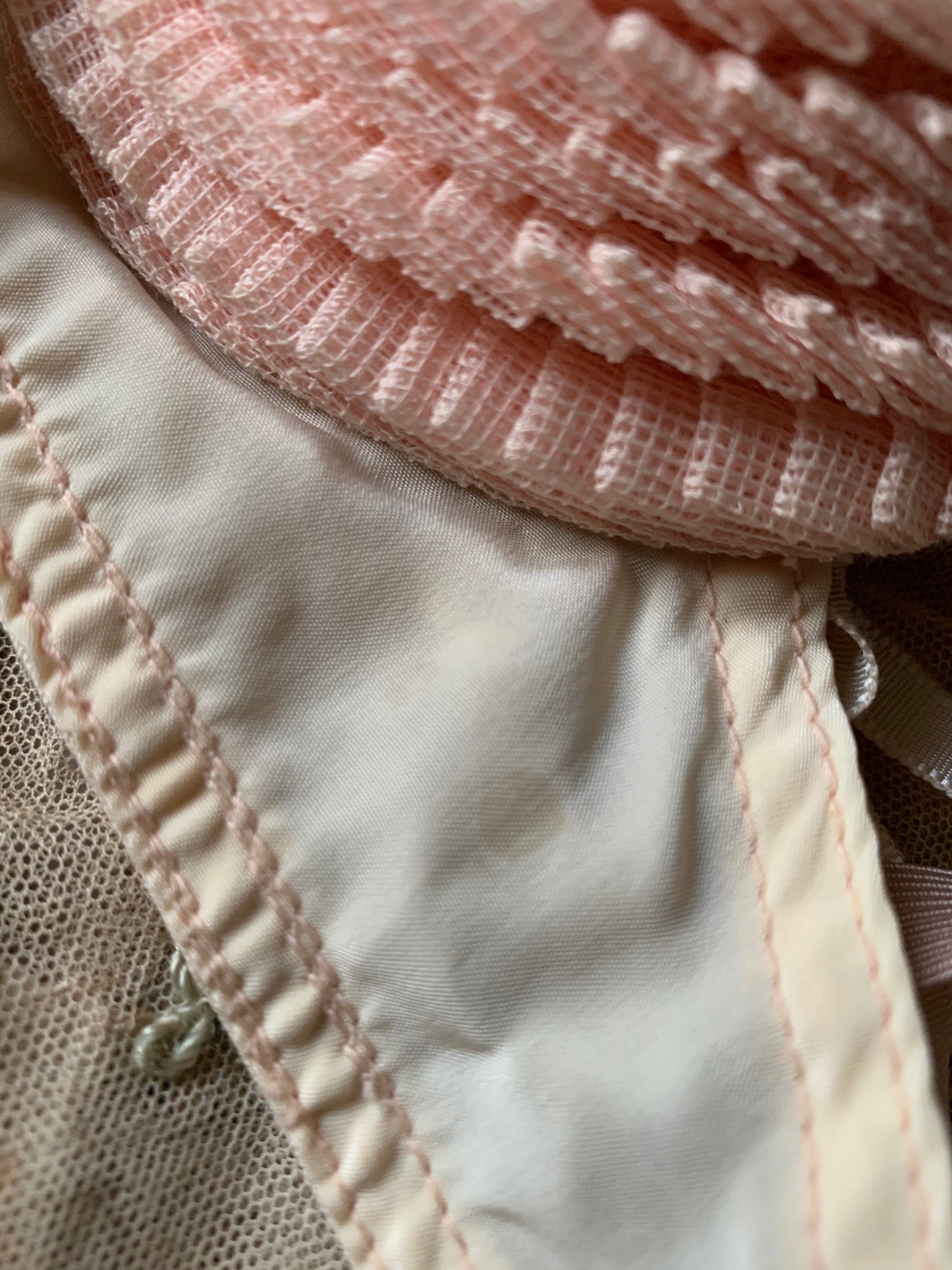 Vintage old pink ruffly bra