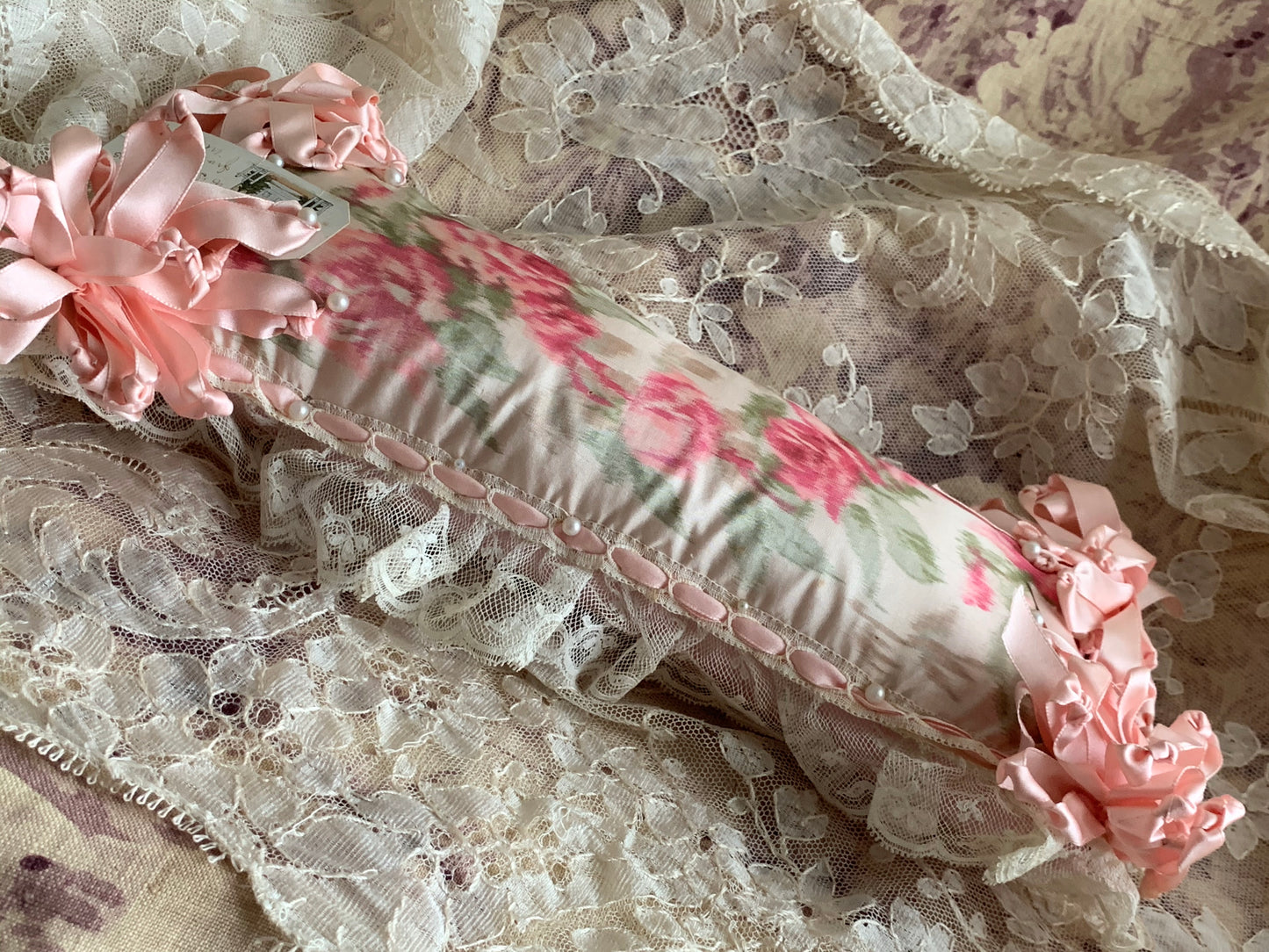Vintage pink silk ribbon stuffed pincushion