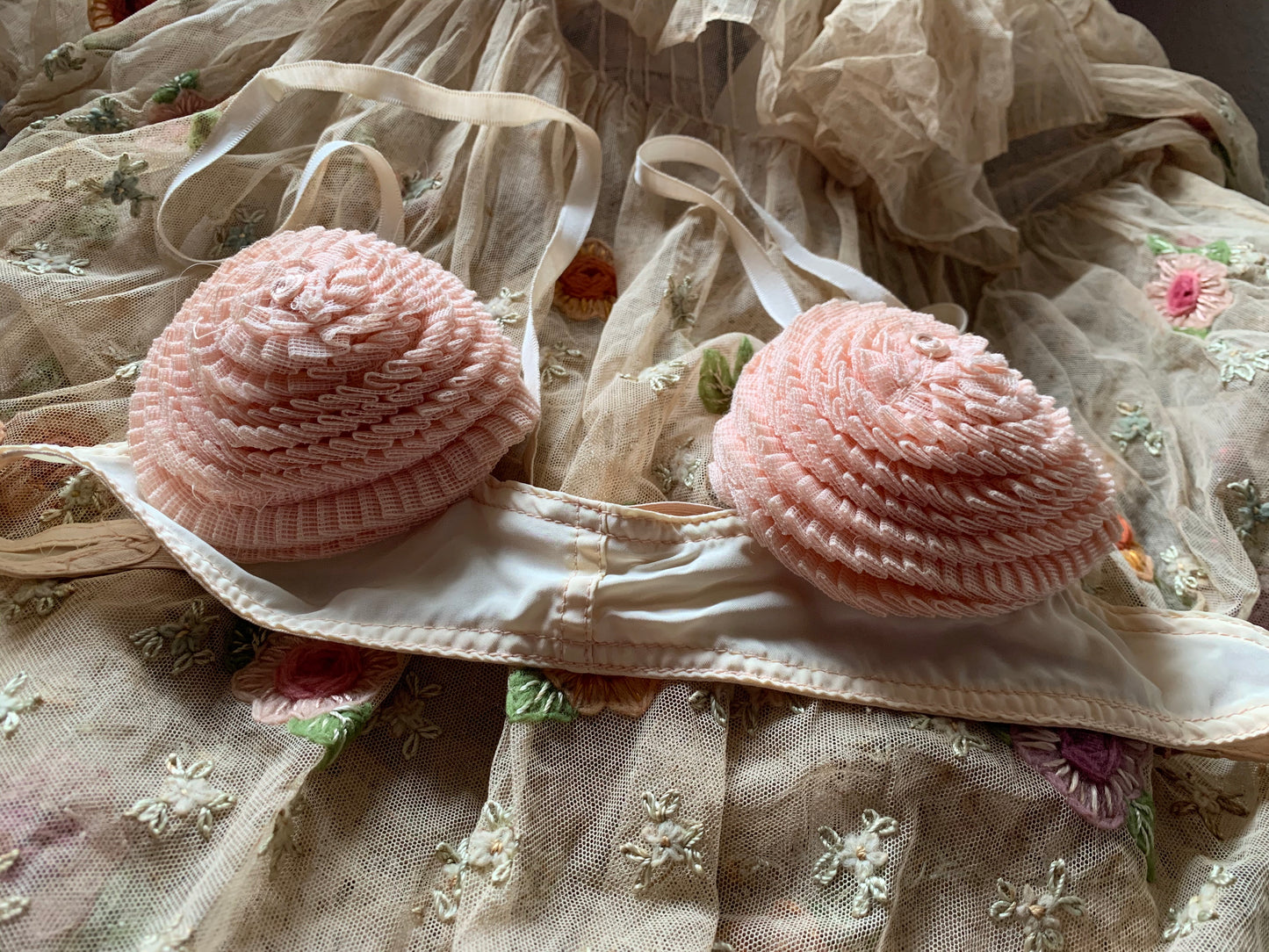 Vintage old pink ruffly bra