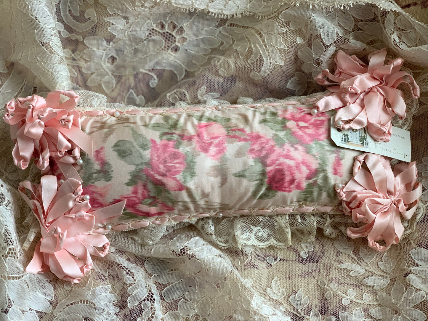 Vintage pink silk ribbon stuffed pincushion