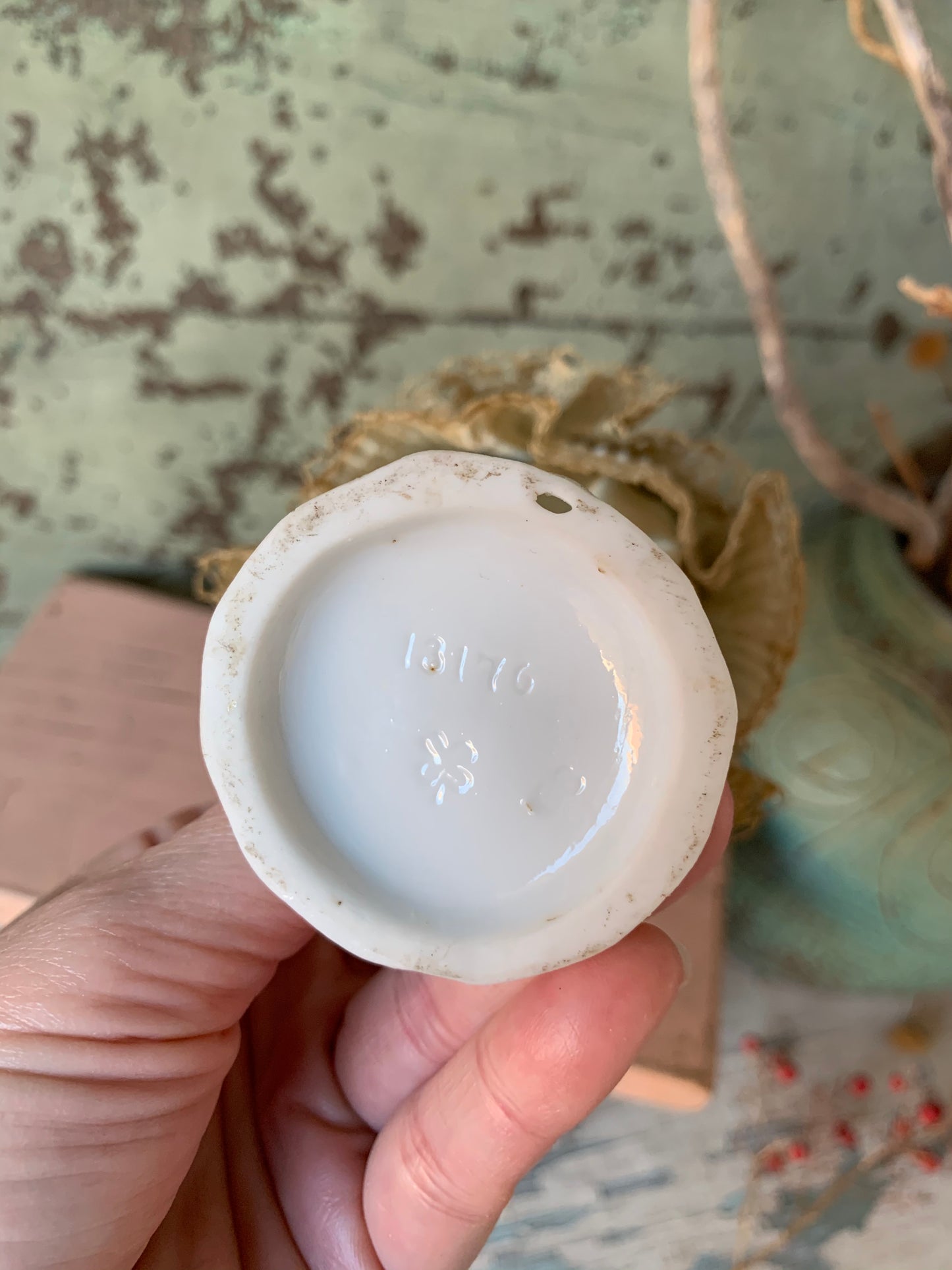 Antique porcelain masked girl figurine