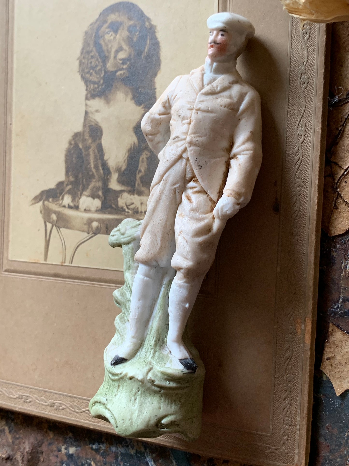 Antique miniature golfer figurine