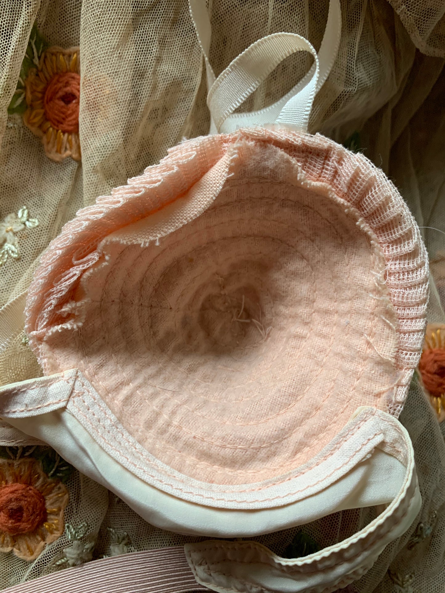 Vintage old pink ruffly bra