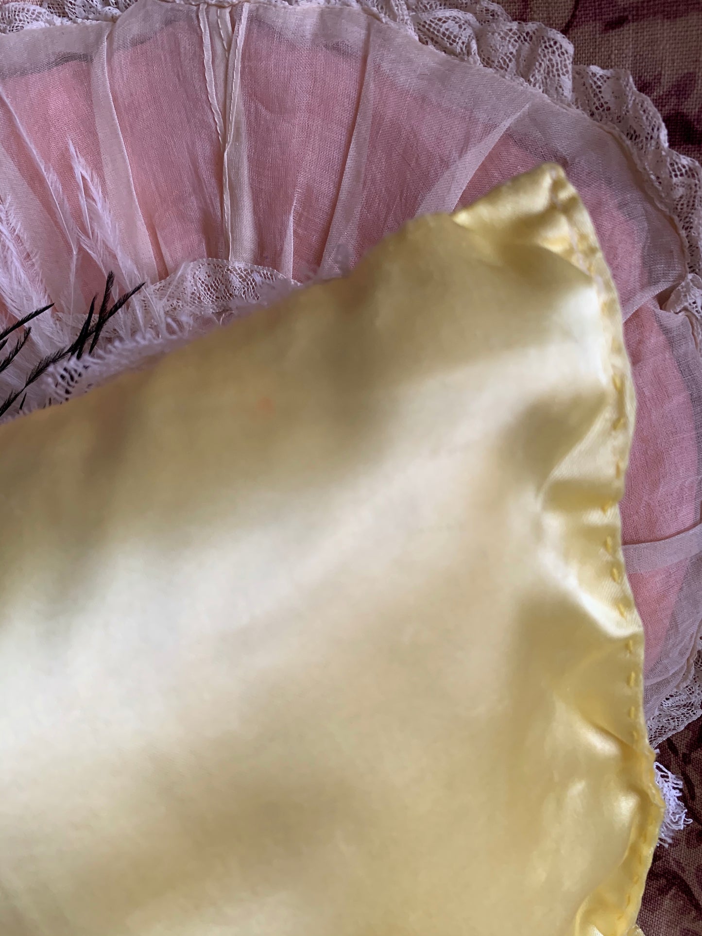 Assembled vintage doll face pillow