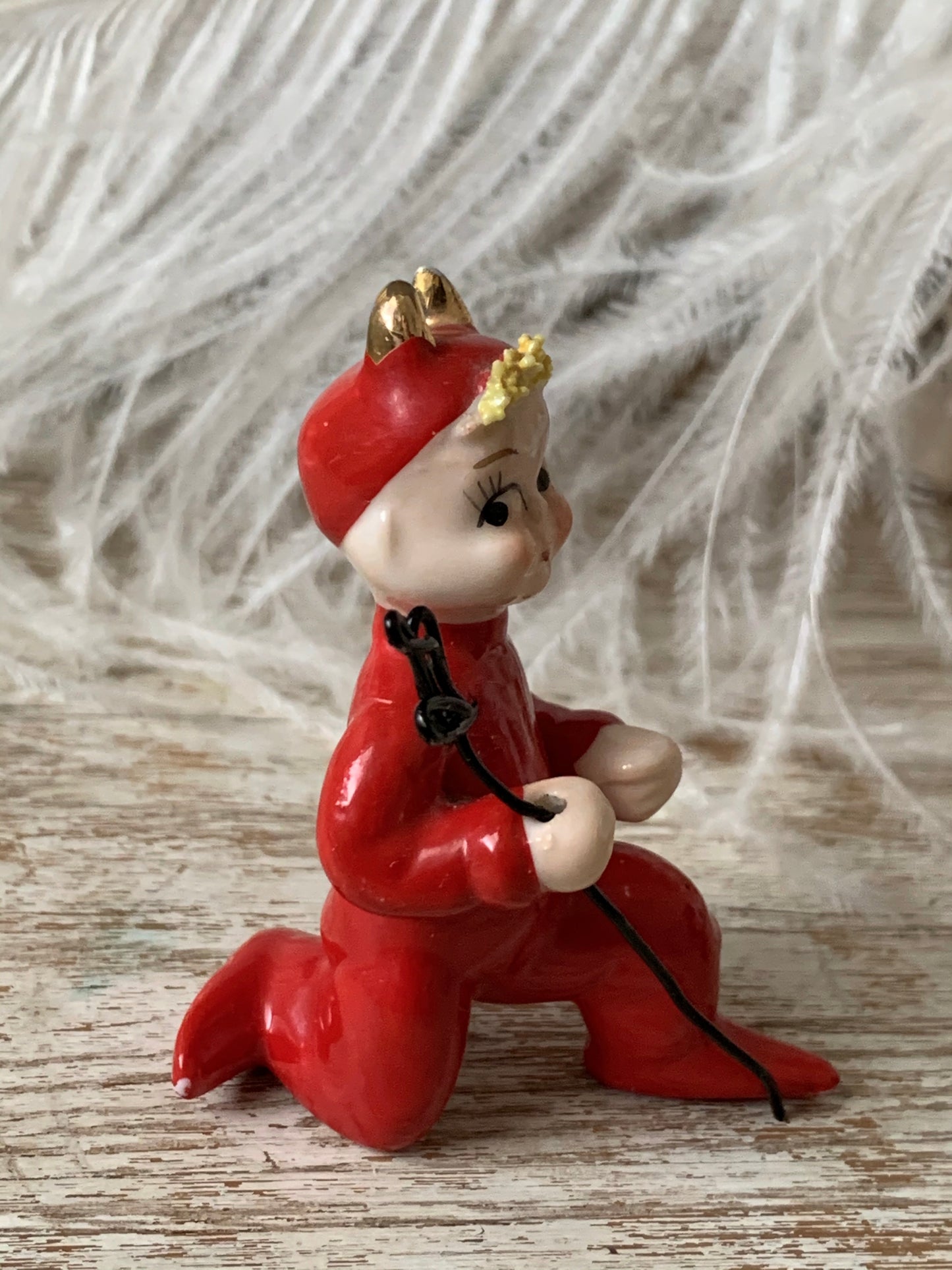 Vintage mini kneeling devil pixie figurine