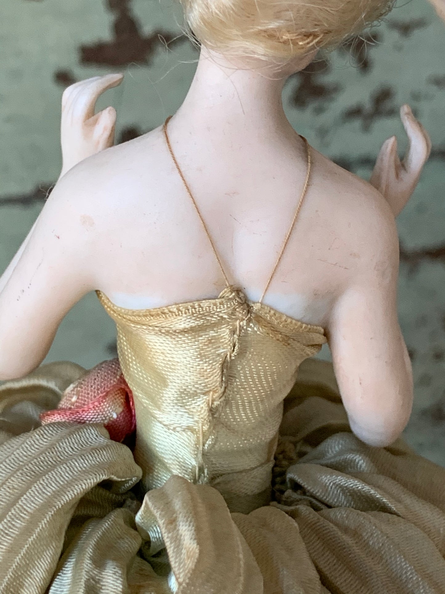 Antique porcelain masked girl figurine