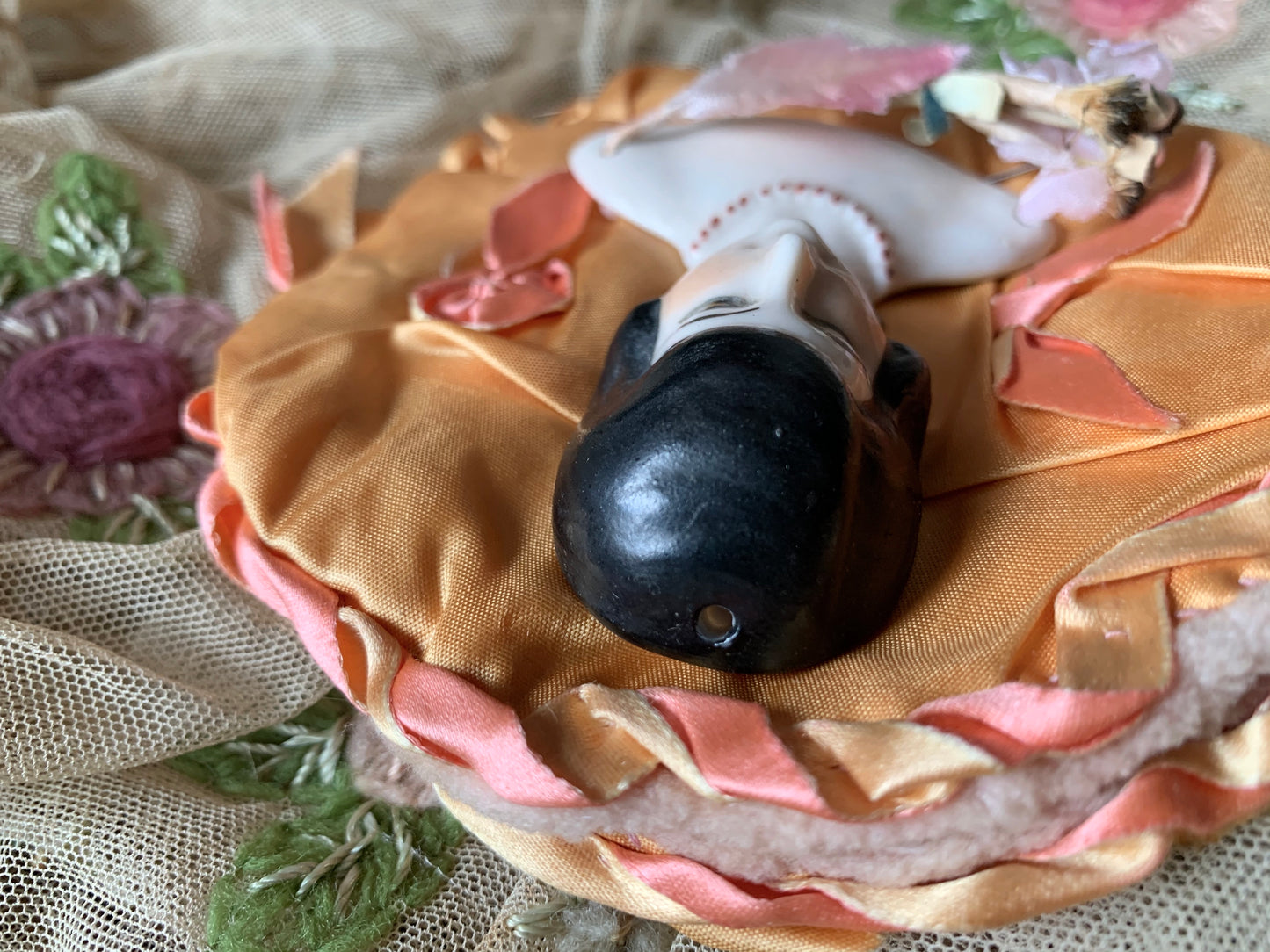 Vintage porcelain half doll flat back bust on silk