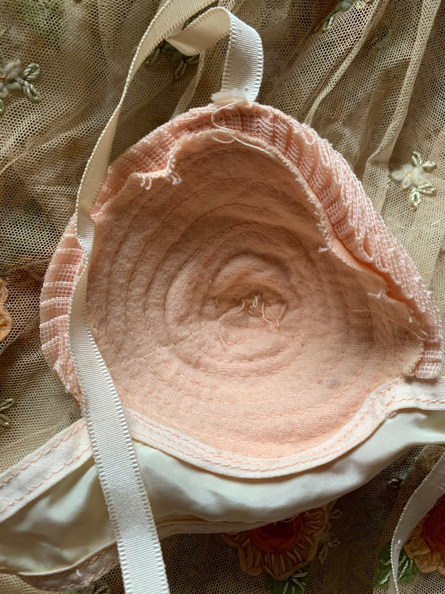 Vintage old pink ruffly bra