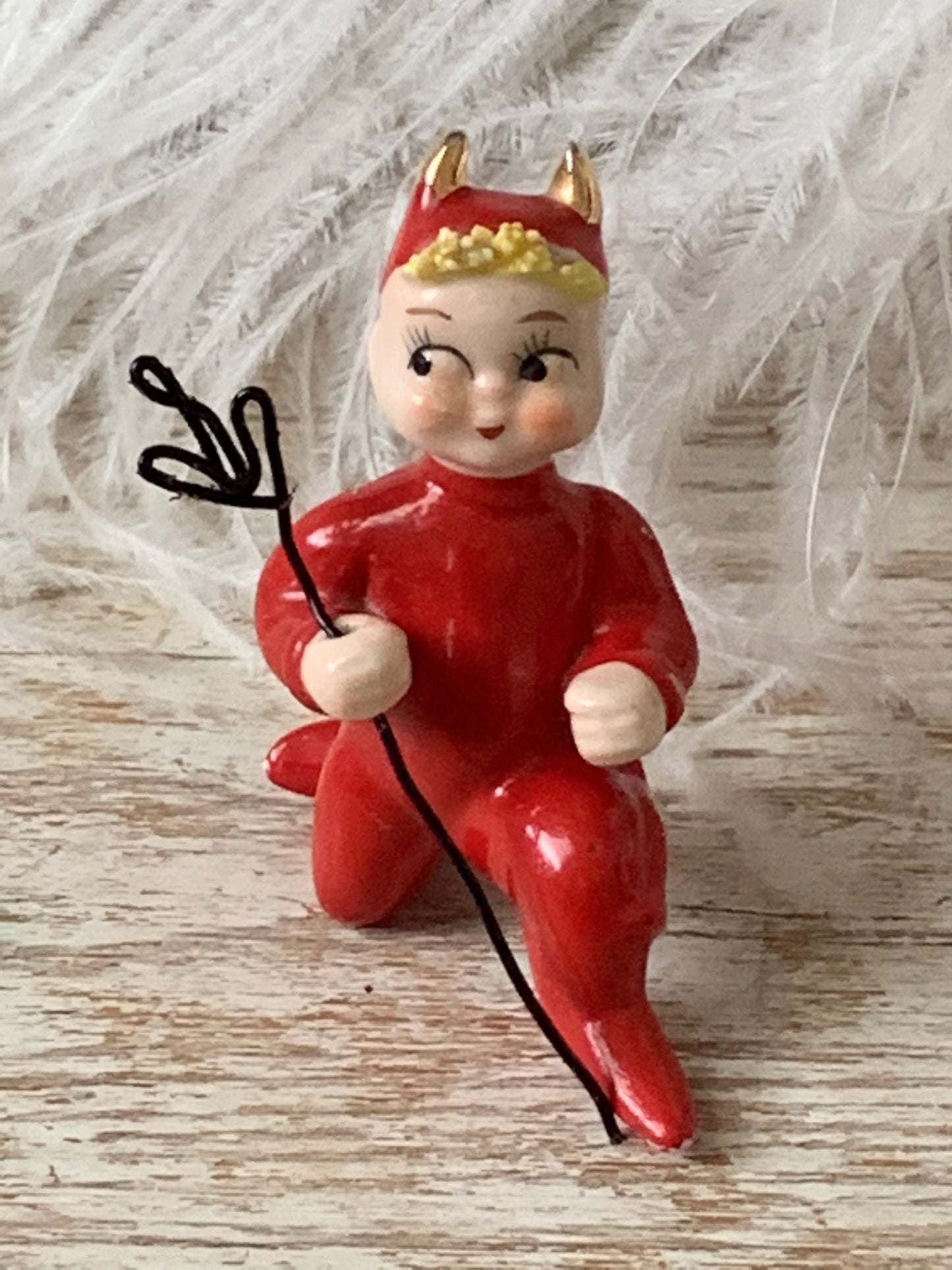 Vintage mini kneeling devil pixie figurine