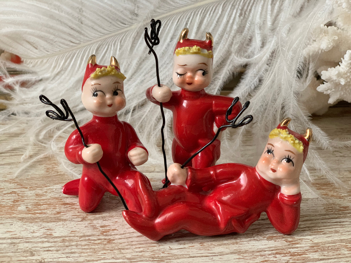 Vintage mini lounging devil pixie figurine