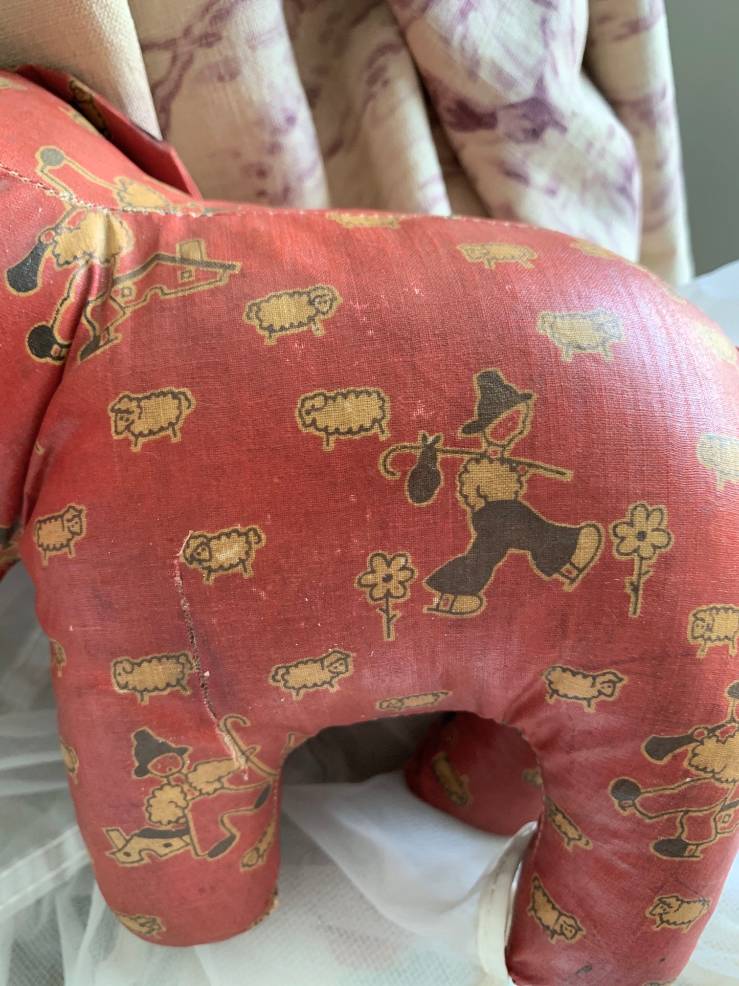 Vintage red oilcloth stuffed toy elephant