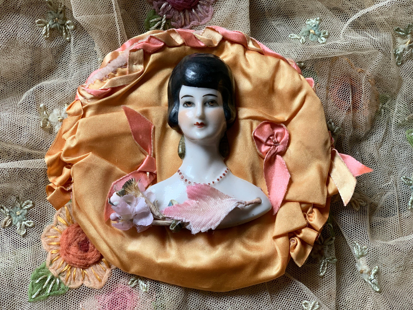 Vintage porcelain half doll flat back bust on silk