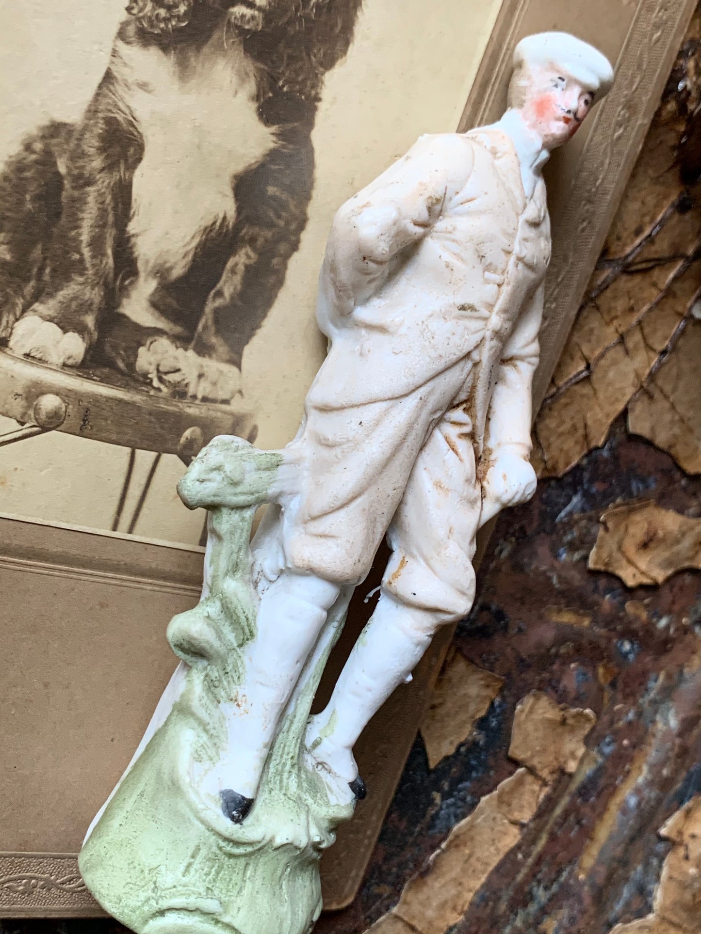 Antique miniature golfer figurine