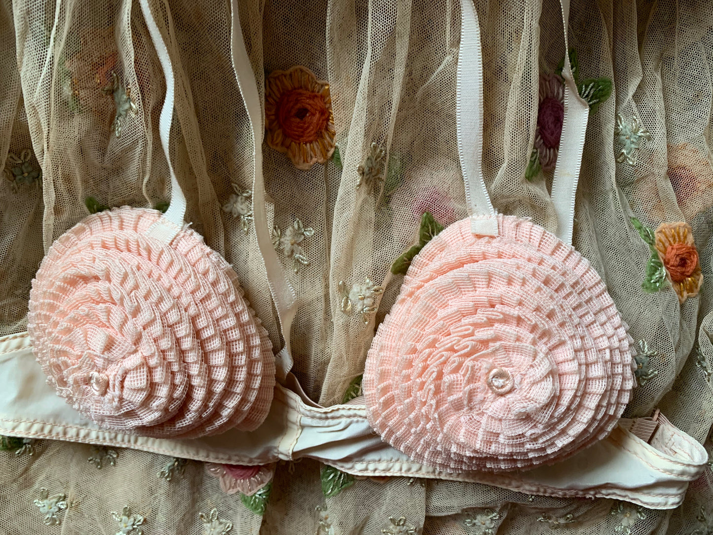 Vintage old pink ruffly bra