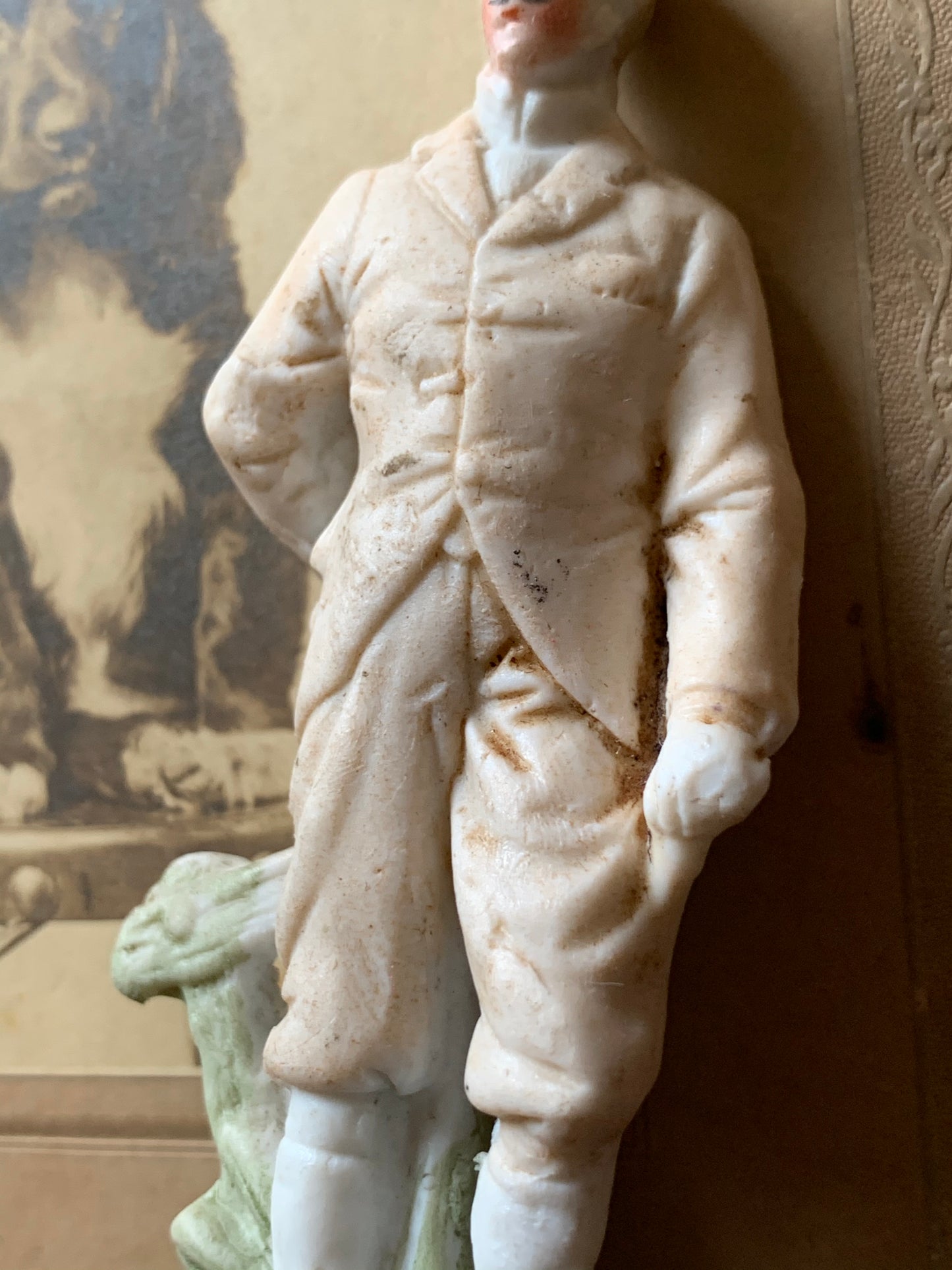 Antique miniature golfer figurine