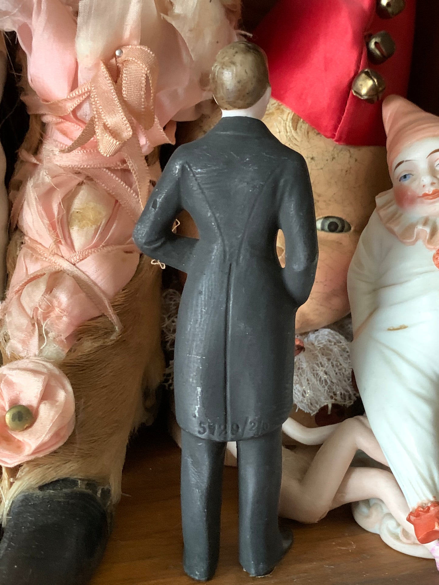 Vintage porcelain groom figure
