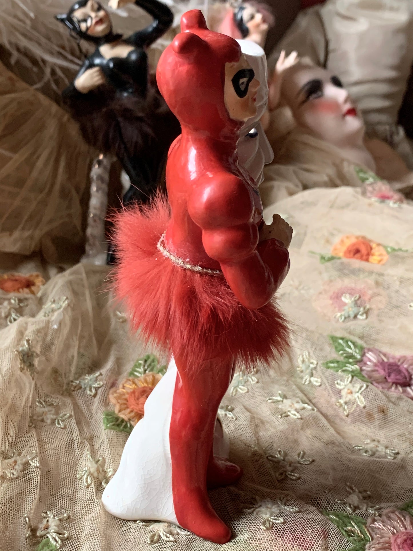 Vintage devil ballerina boy with mask