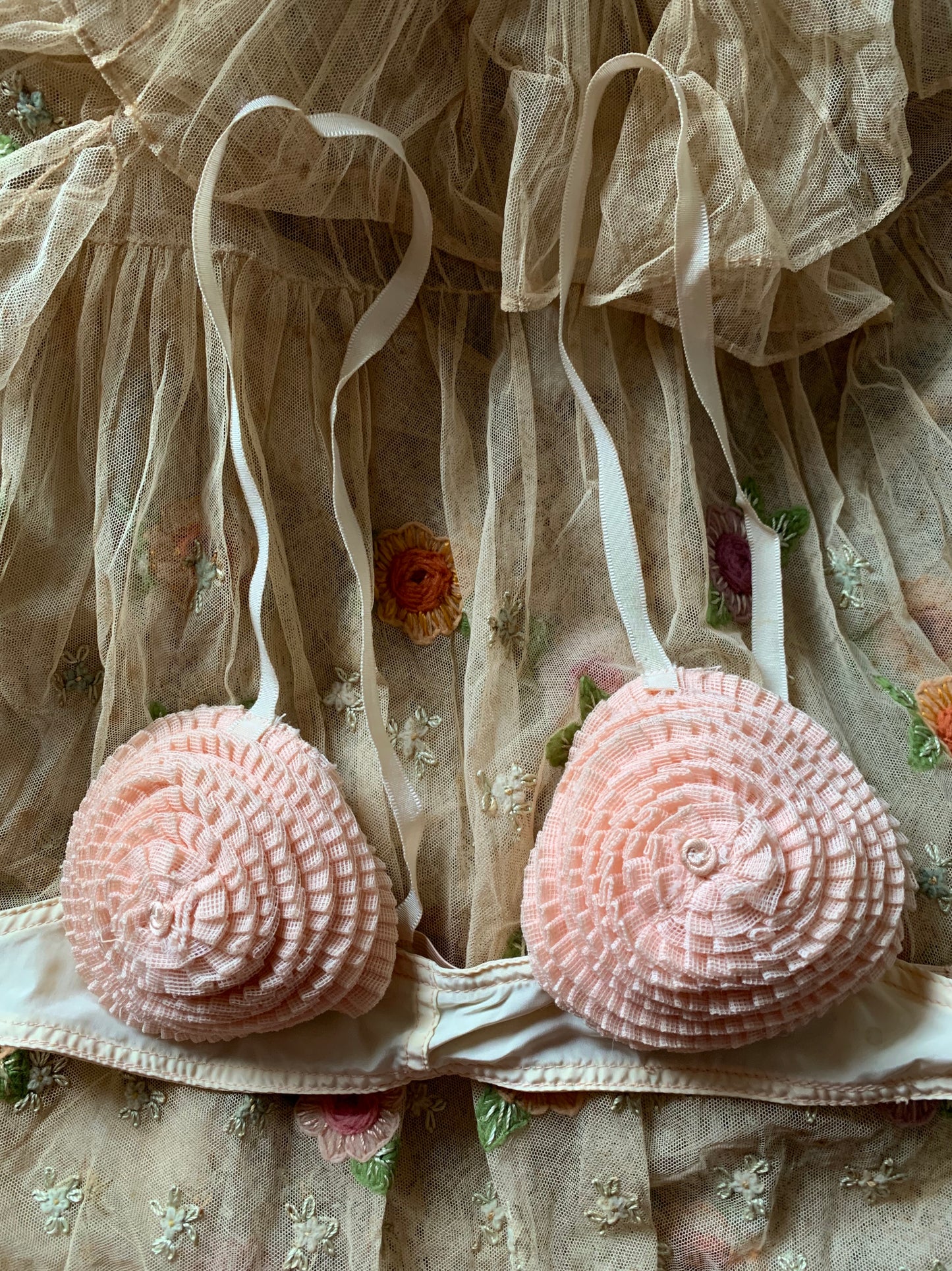 Vintage old pink ruffly bra