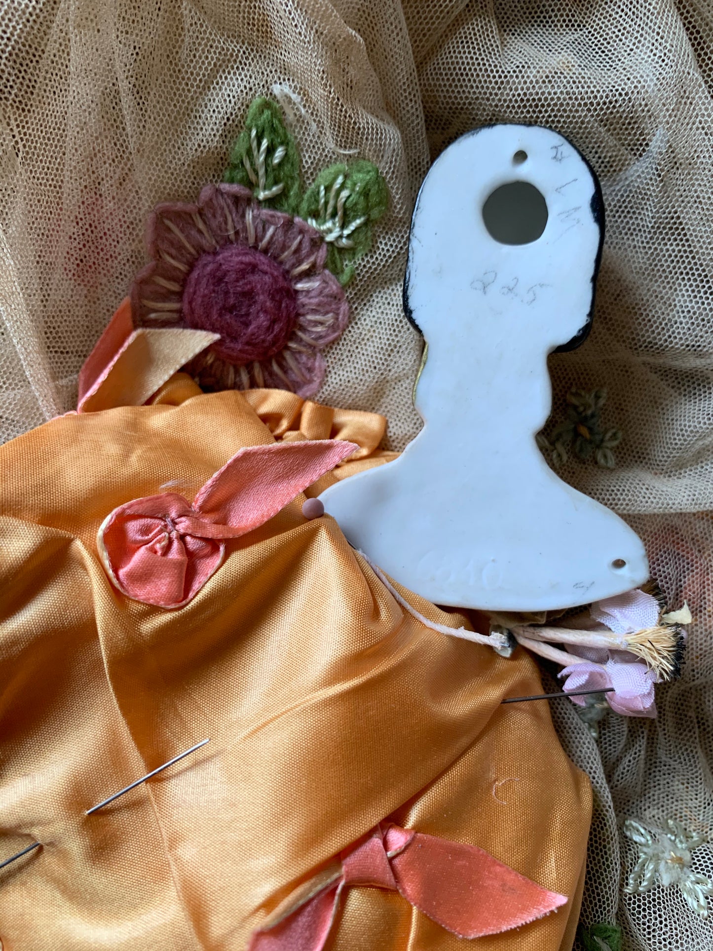 Vintage porcelain half doll flat back bust on silk