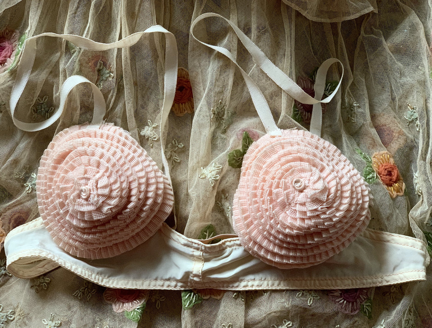 Vintage old pink ruffly bra
