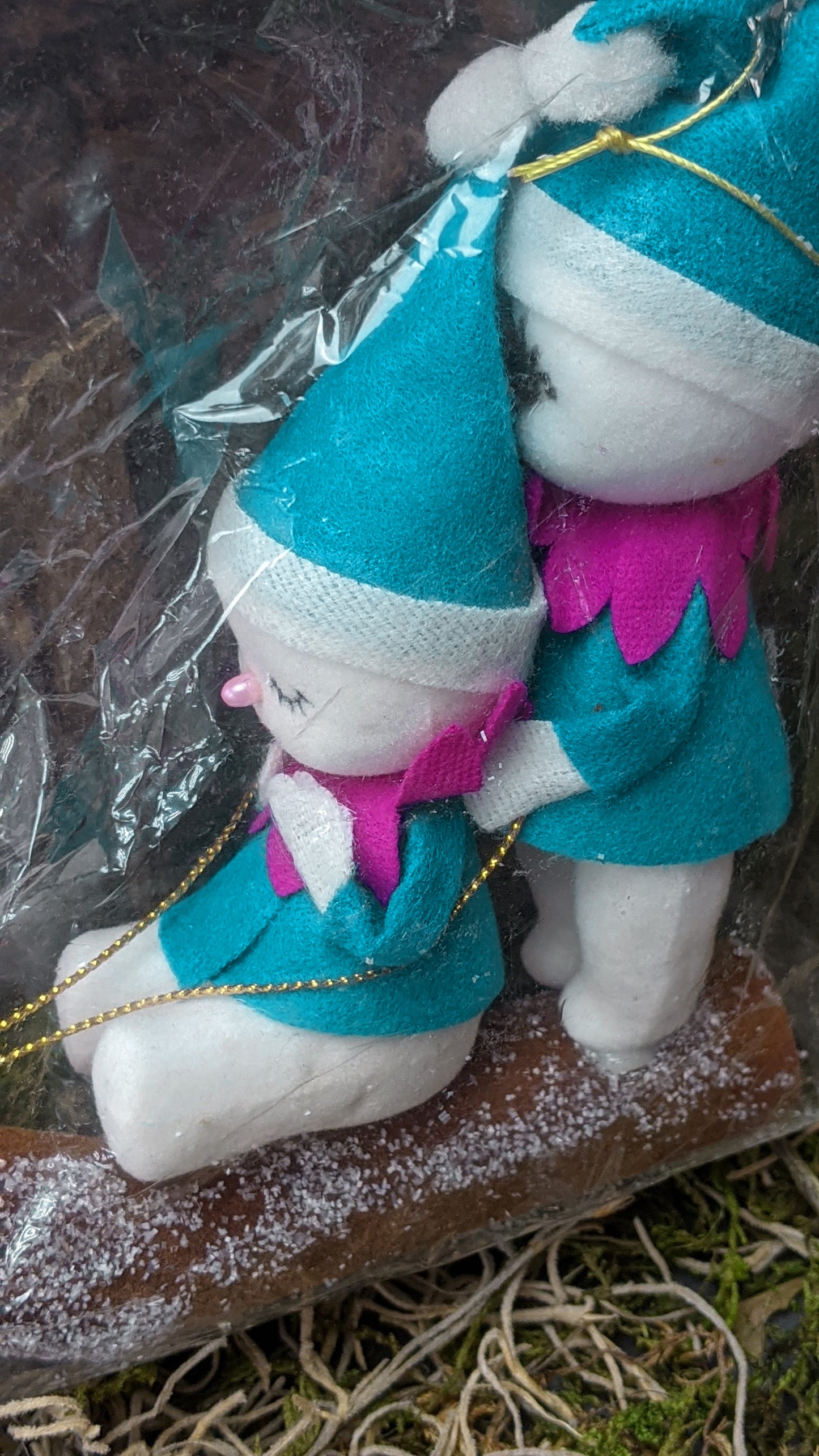 Vintage snow pixies decoration in package