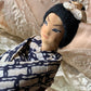 Vintage Geisha girl knee hugger doll