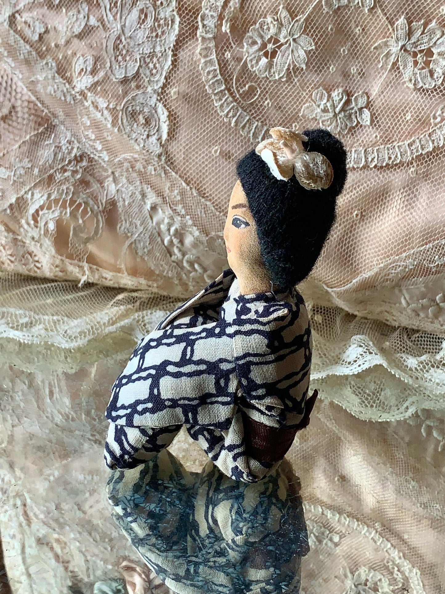 Vintage Geisha girl knee hugger doll