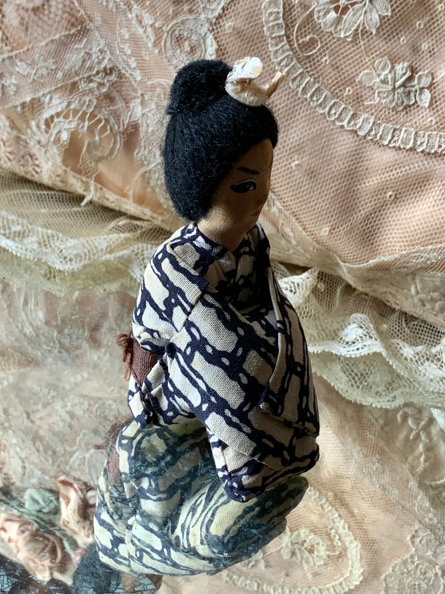 Vintage Geisha girl knee hugger doll