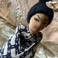 Vintage Geisha girl knee hugger doll