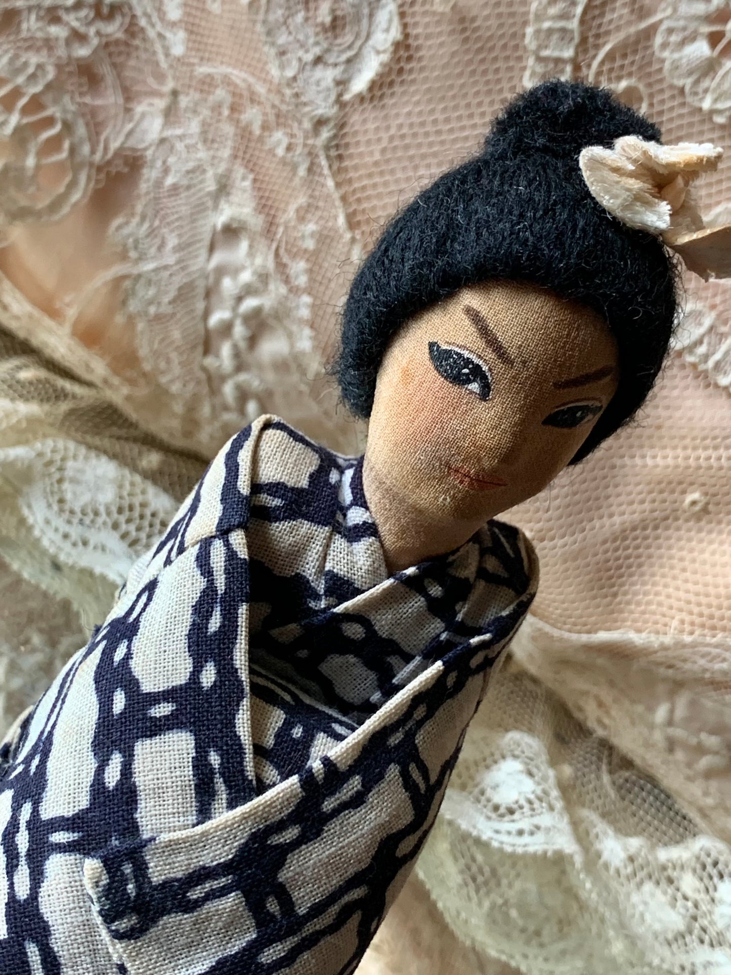 Vintage Geisha girl knee hugger doll