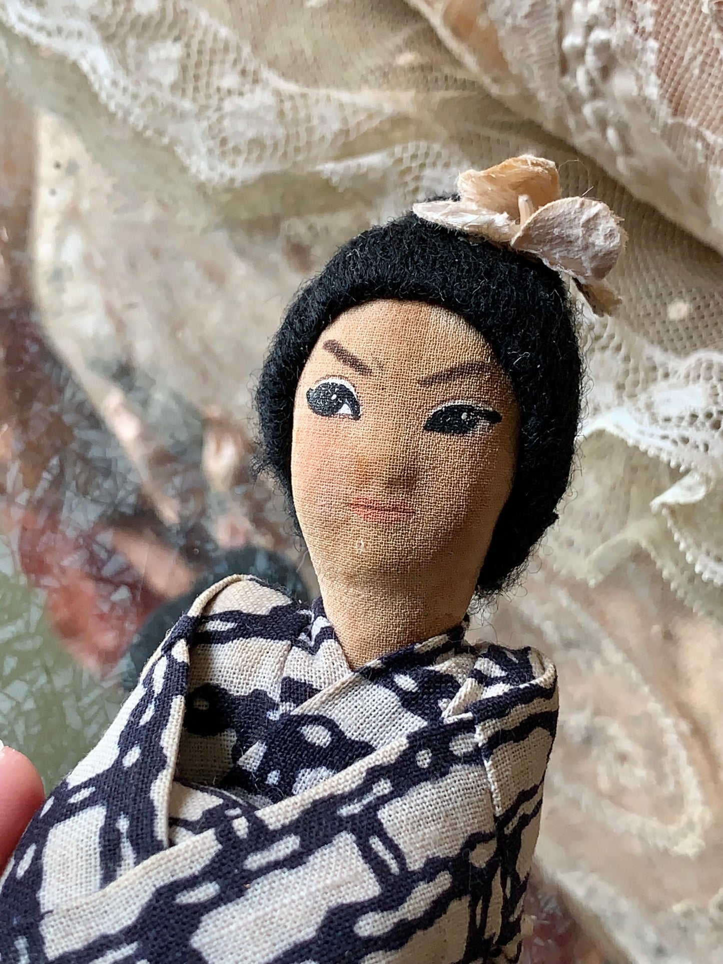 Vintage Geisha girl knee hugger doll