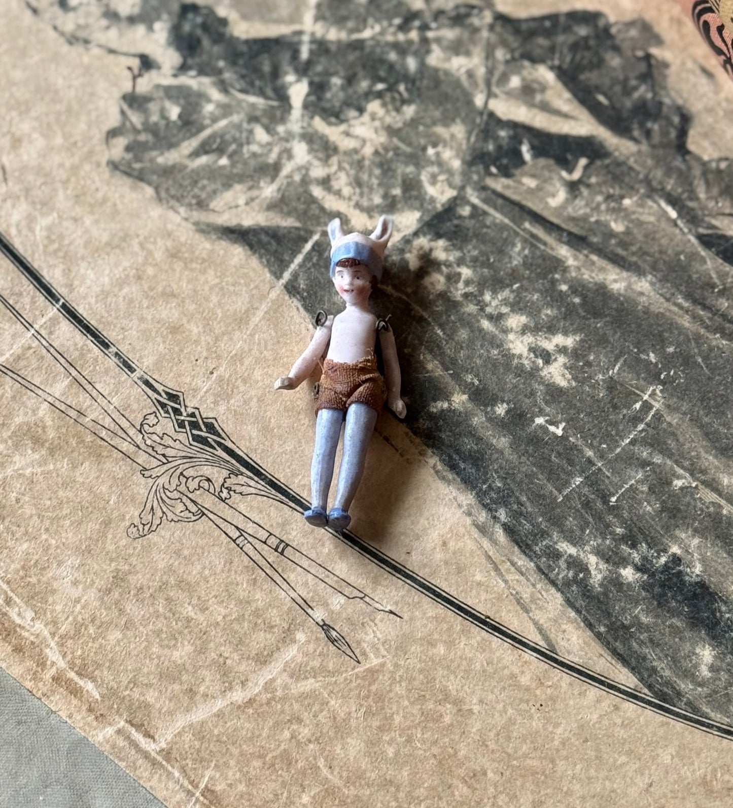 Antique miniature bunny girl doll tiny bisque doll