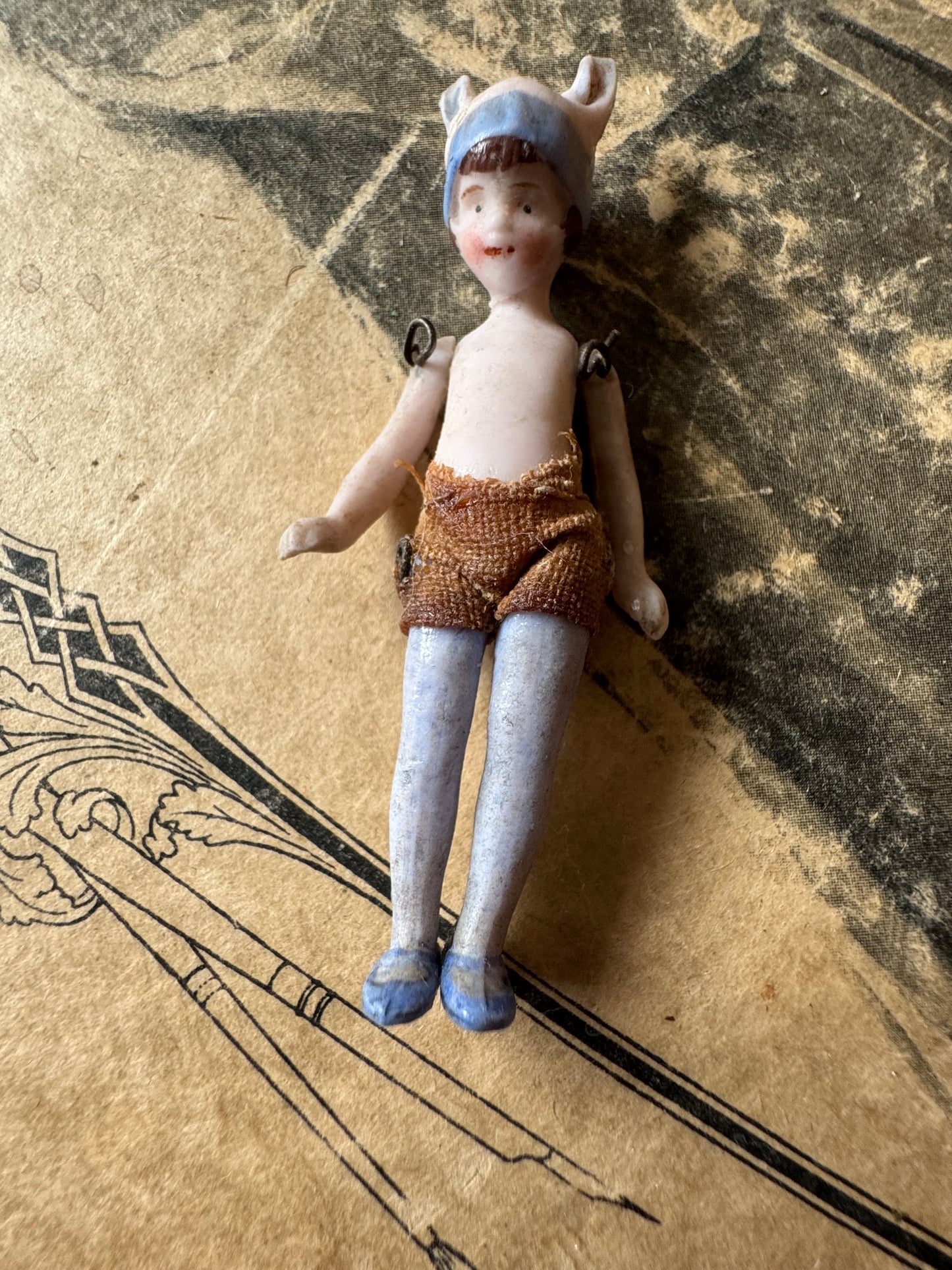 Antique miniature bunny girl doll tiny bisque doll