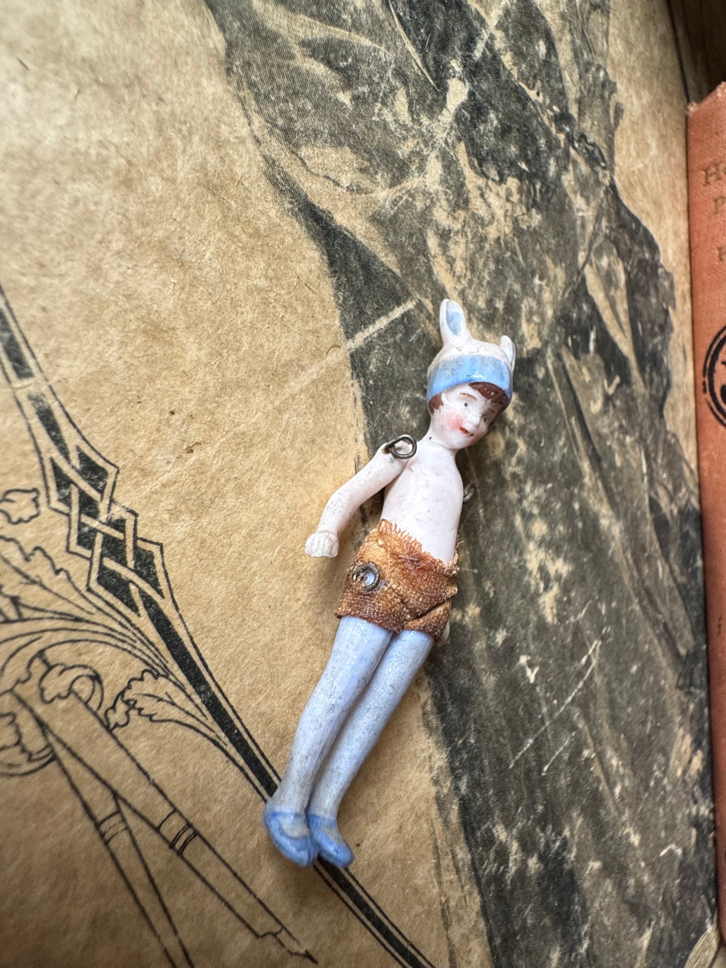 Antique miniature bunny girl doll tiny bisque doll