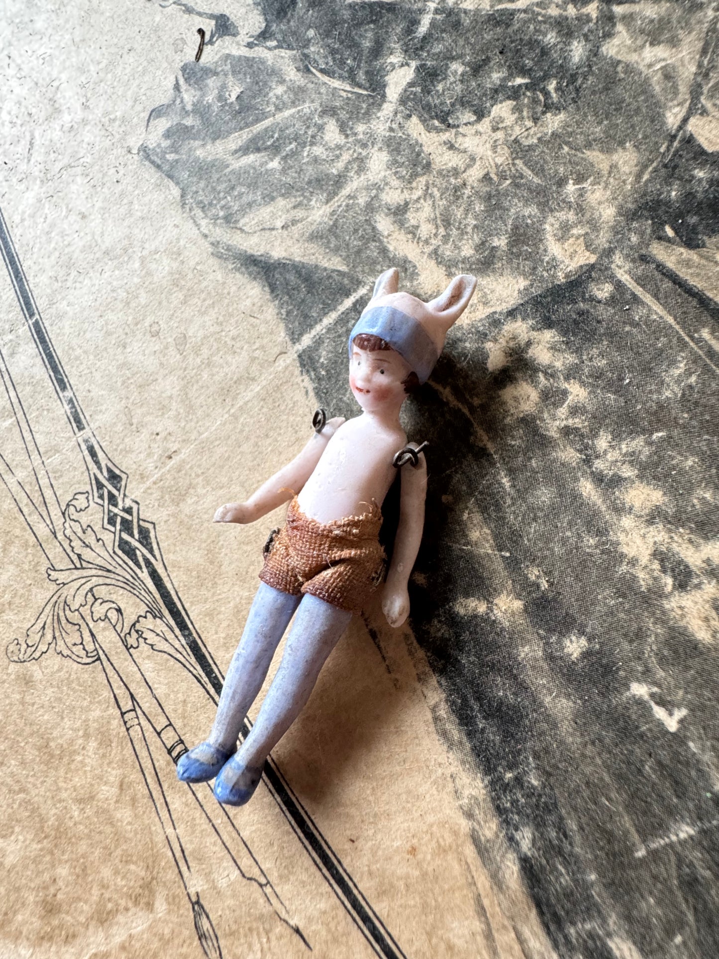 Antique miniature bunny girl doll tiny bisque doll