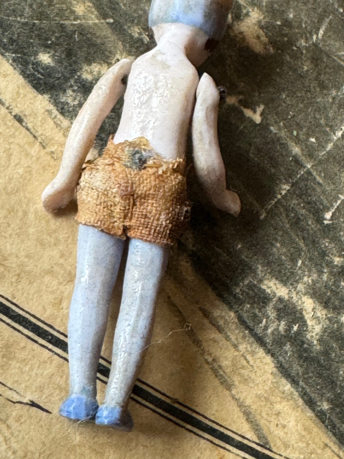 Antique miniature bunny girl doll tiny bisque doll