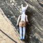 Antique miniature bunny girl doll tiny bisque doll