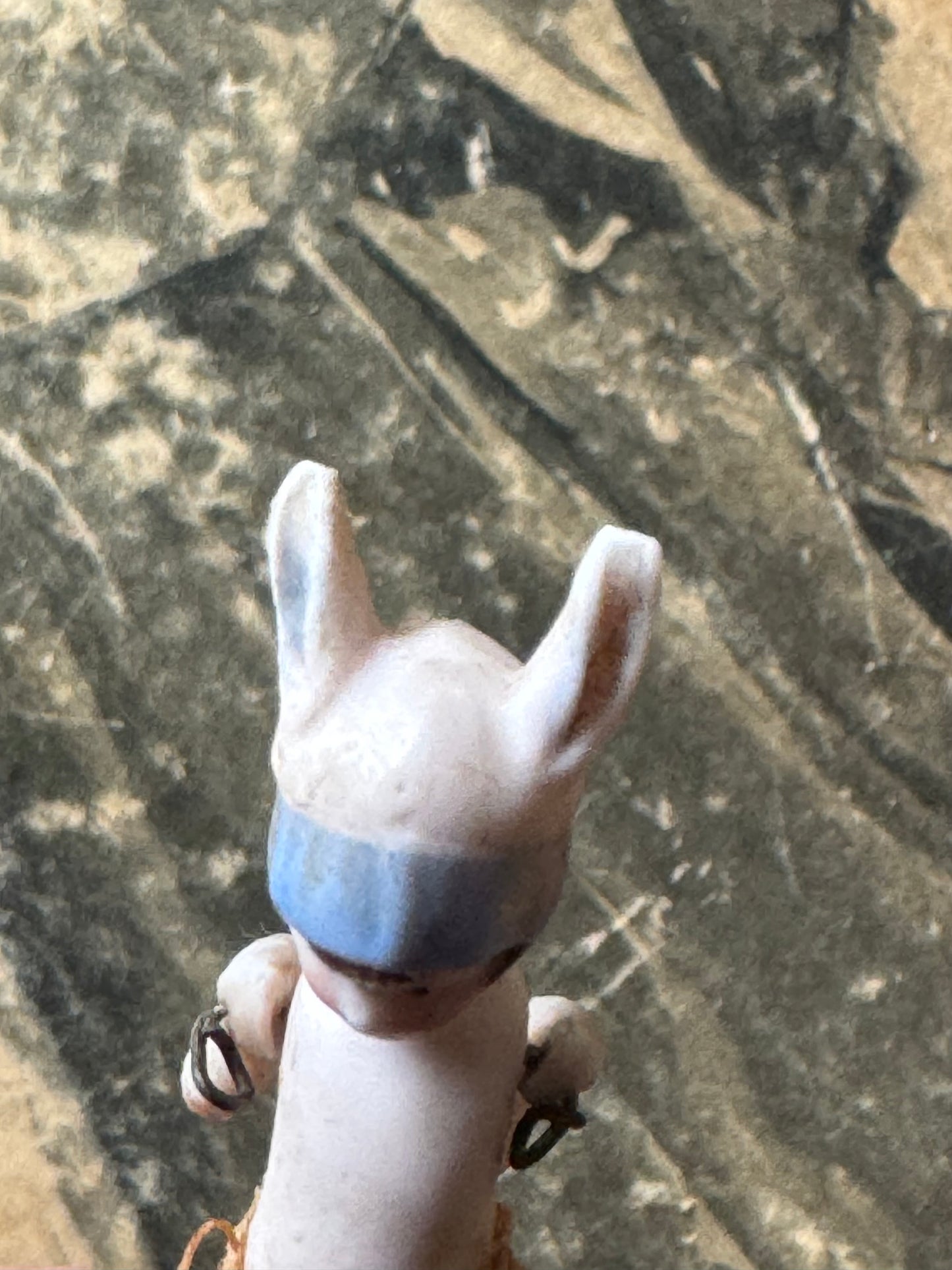 Antique miniature bunny girl doll tiny bisque doll