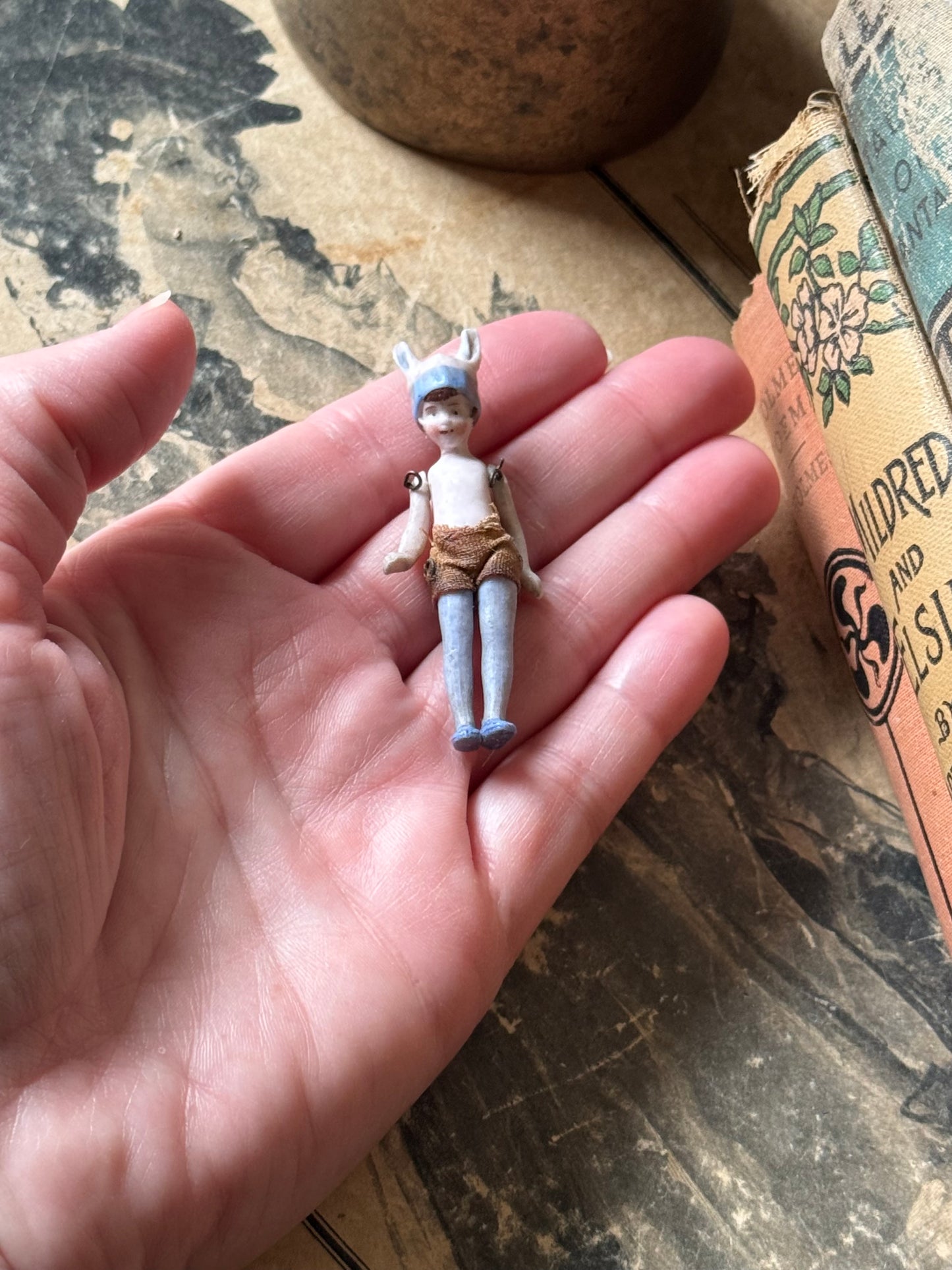 Antique miniature bunny girl doll tiny bisque doll