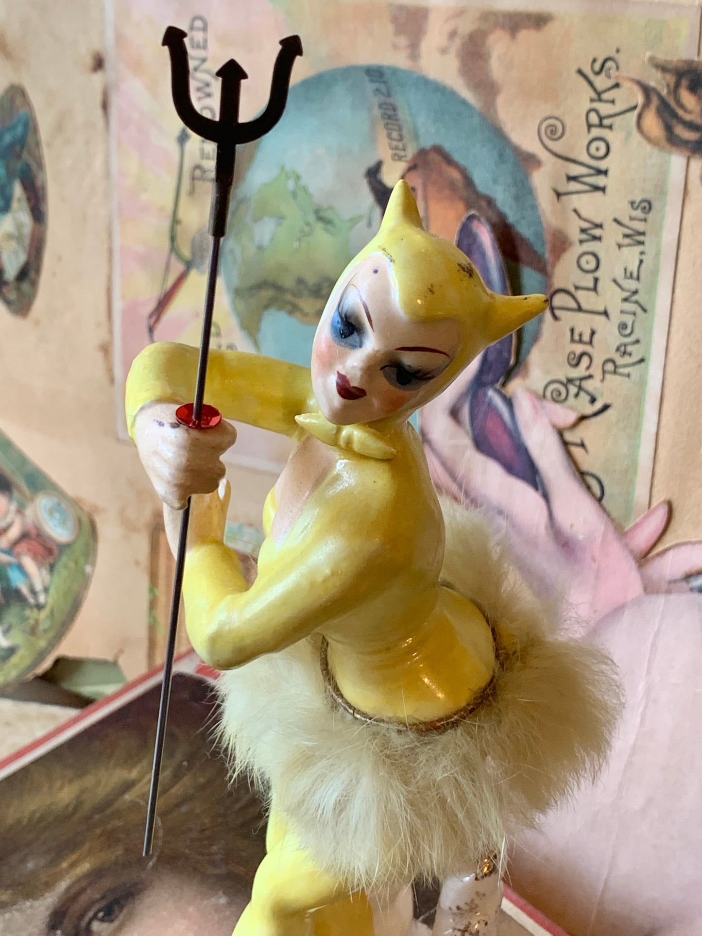 Vintage yellow she devil ballerina figurine