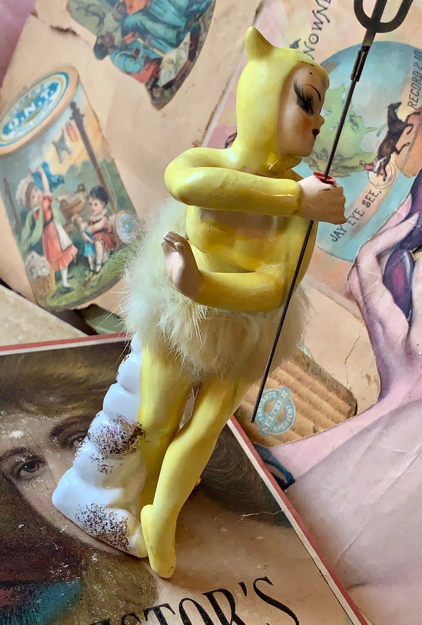 Vintage yellow she devil ballerina figurine