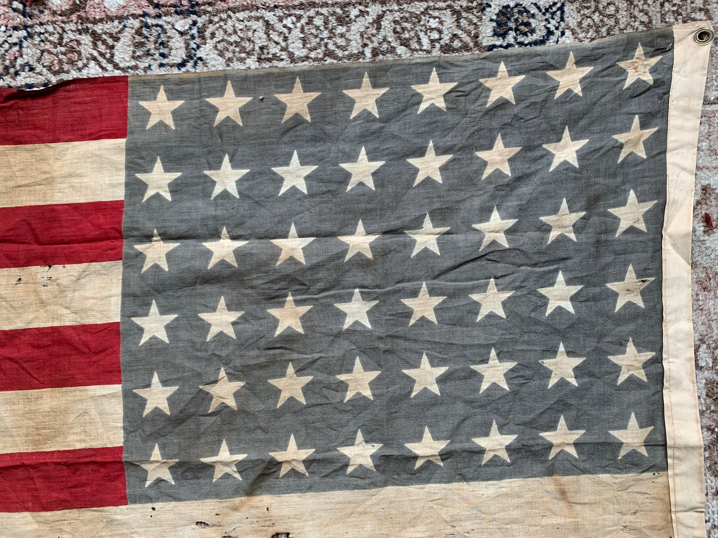 Vintage tattered old 48 star USA flag