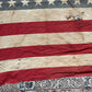 Vintage tattered old 48 star USA flag
