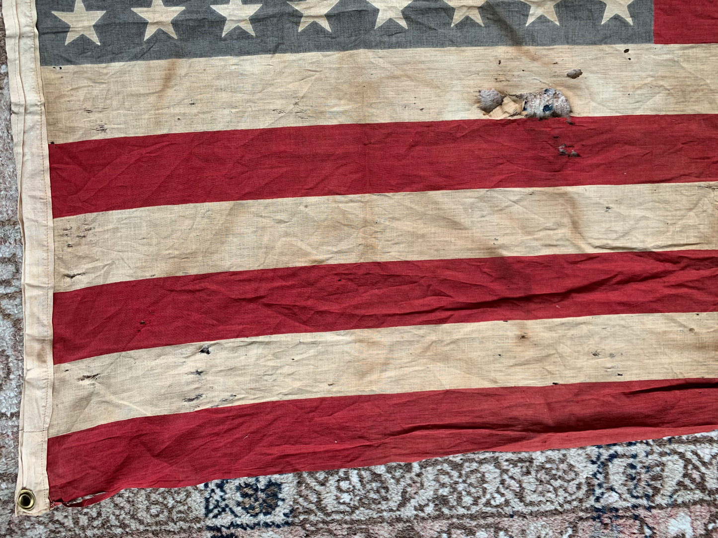 Vintage tattered old 48 star USA flag