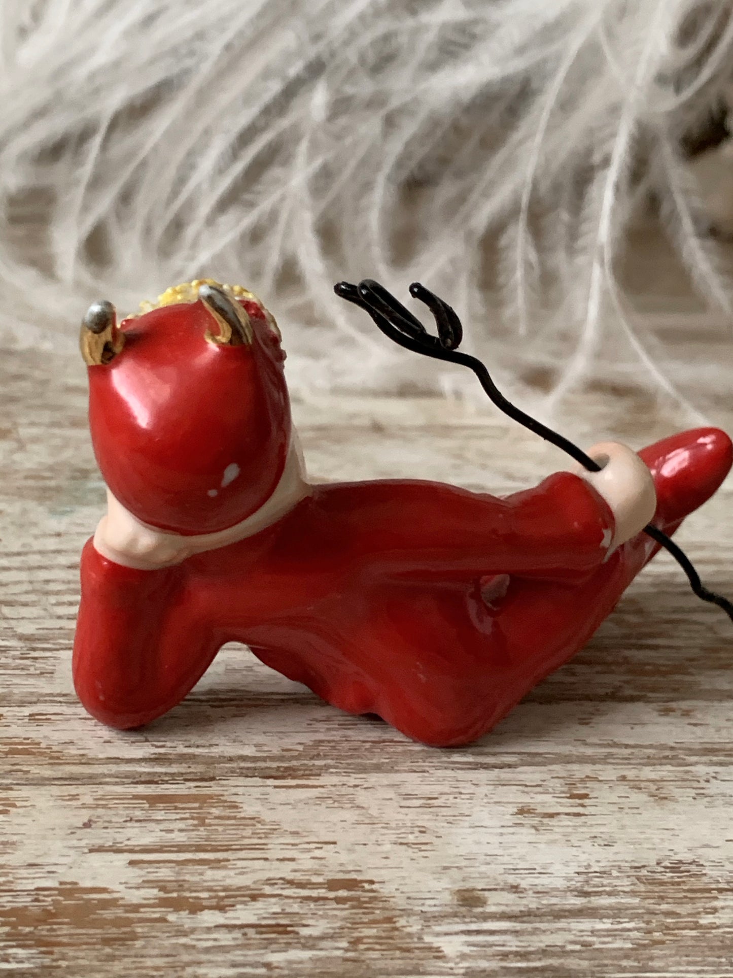 Vintage mini lounging devil pixie figurine