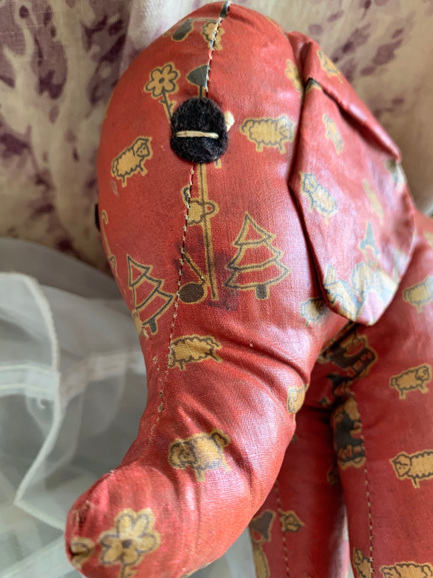 Vintage red oilcloth stuffed toy elephant