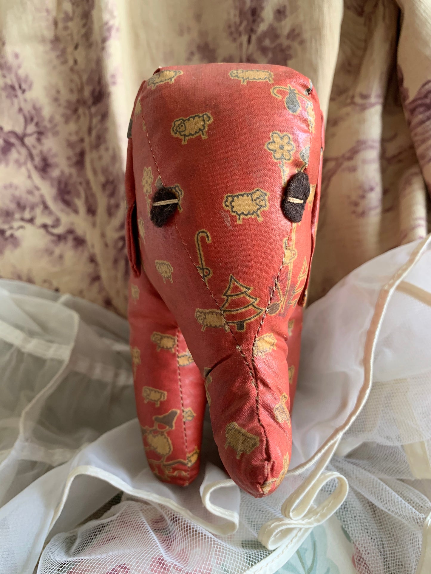 Vintage red oilcloth stuffed toy elephant