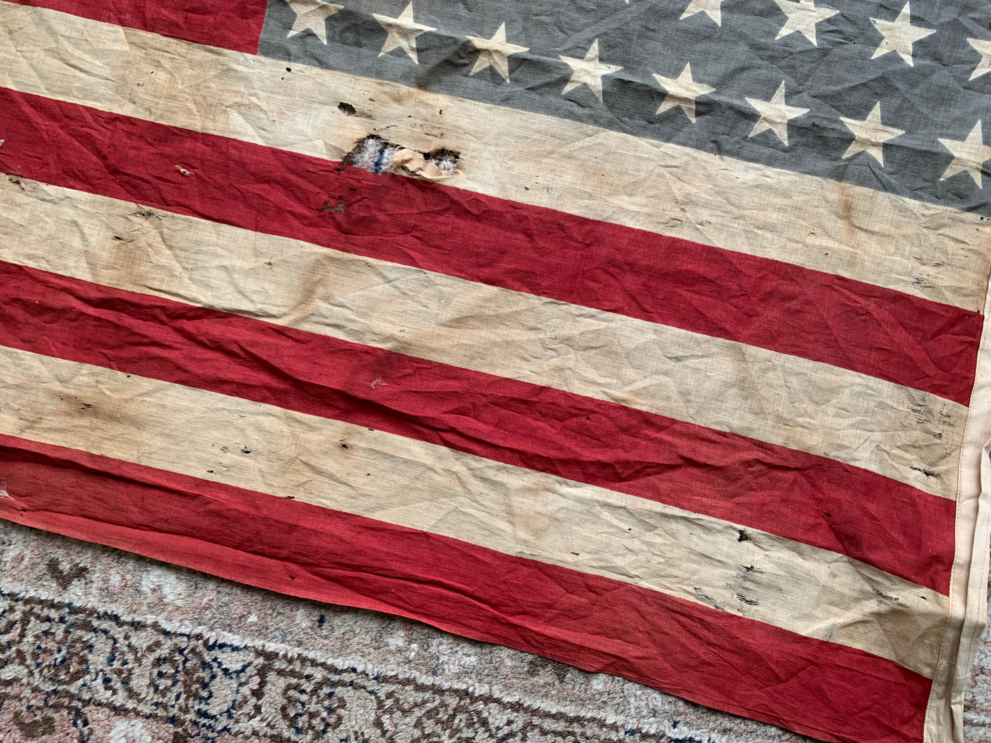 Vintage tattered old 48 star USA flag